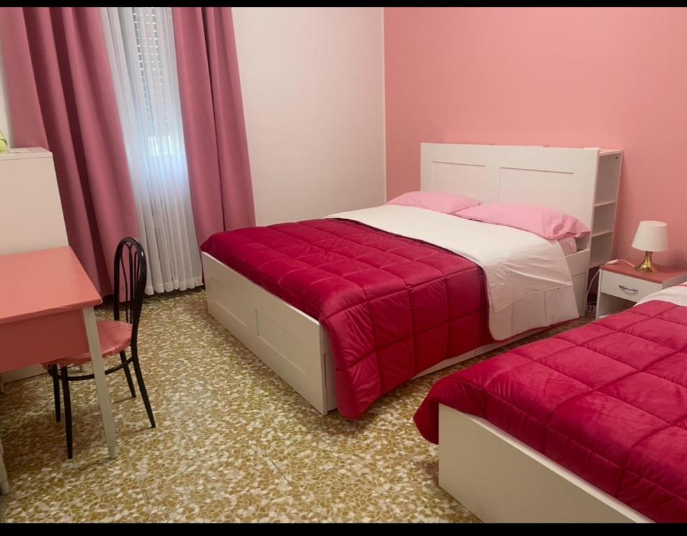 Postel nebo postele na pokoji v ubytování Aeroporto room