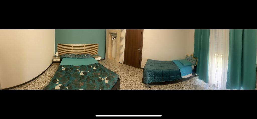 Postel nebo postele na pokoji v ubytování Aeroporto room