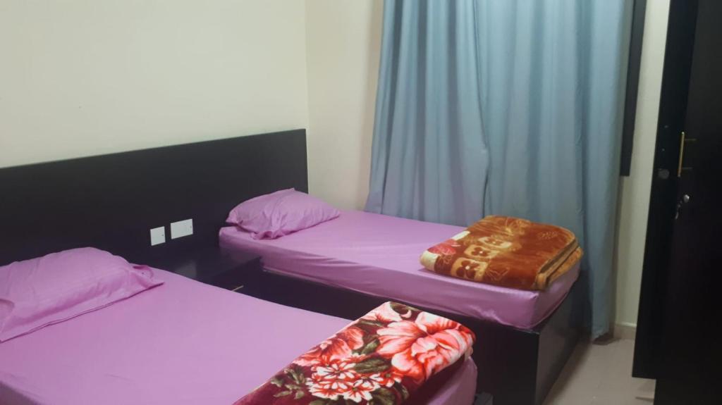 Postelja oz. postelje v sobi nastanitve madam hostel 2