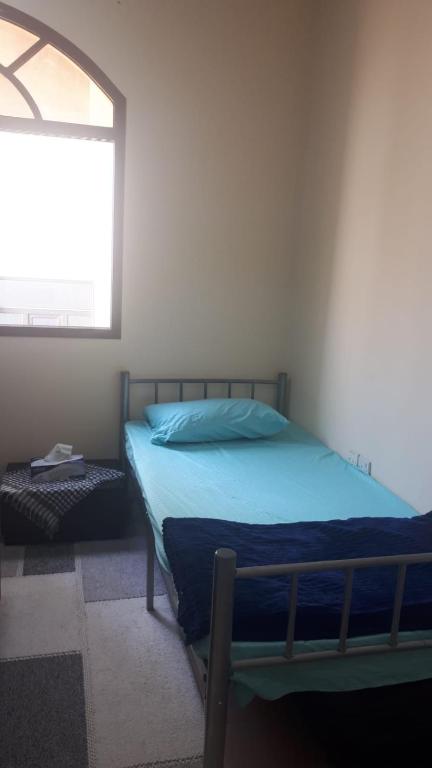 Postelja oz. postelje v sobi nastanitve madam hostel 2