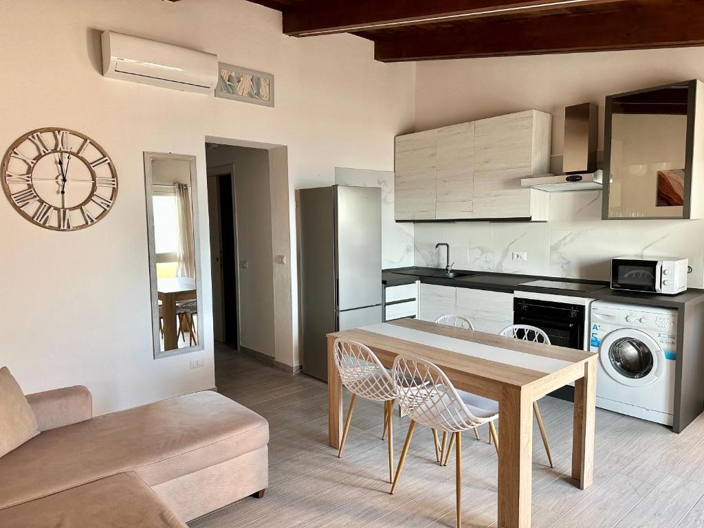 Kuchyň nebo kuchyňský kout v ubytování Approdo Apartments