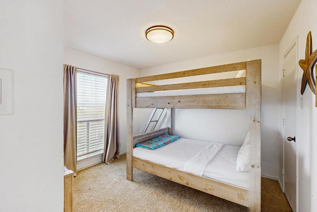 Postel nebo postele na pokoji v ubytování Beach Club 352