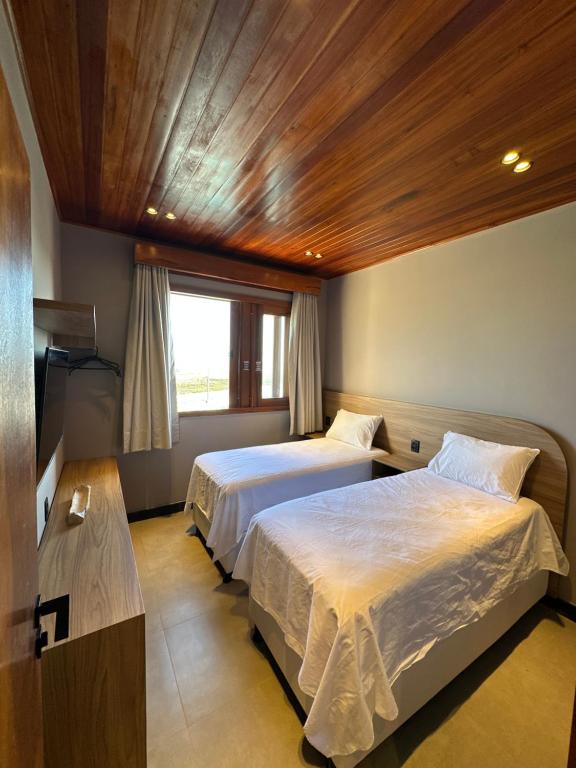 Postel nebo postele na pokoji v ubytování Villa Prime Beach Flats