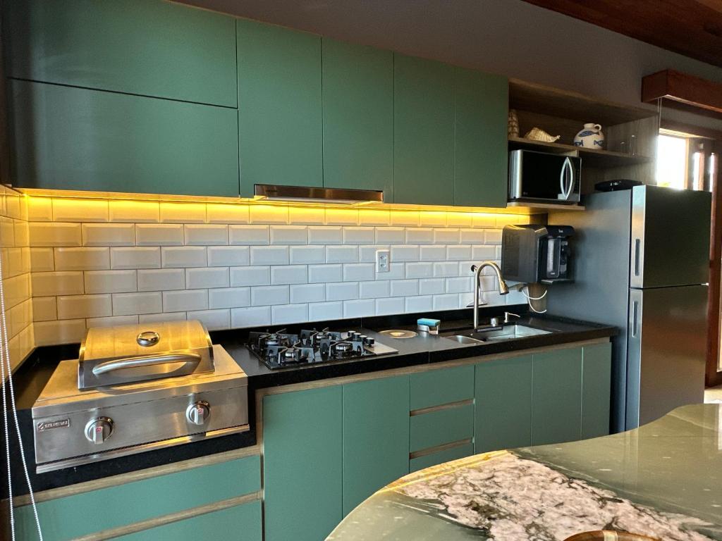 Kuchyň nebo kuchyňský kout v ubytování Villa Prime Beach Flats
