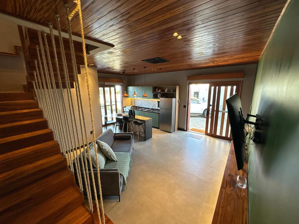 TV a/nebo společenská místnost v ubytování Villa Prime Beach Flats