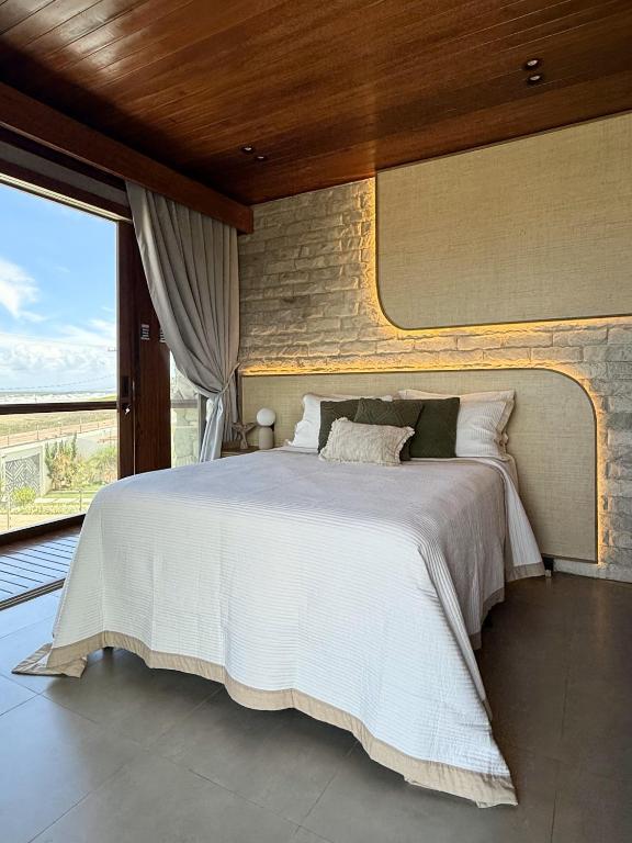 Postel nebo postele na pokoji v ubytování Villa Prime Beach Flats