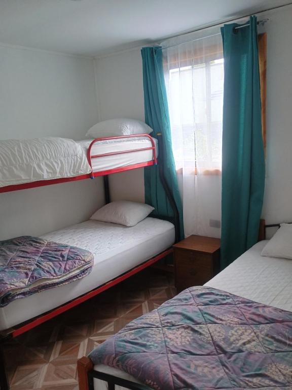 Postel nebo postele na pokoji v ubytování Cabañas more licanray con tinaja