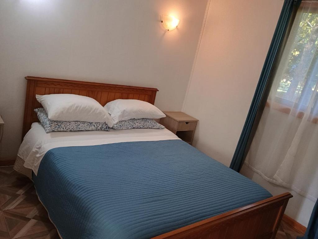 Postel nebo postele na pokoji v ubytování Cabañas more licanray con tinaja