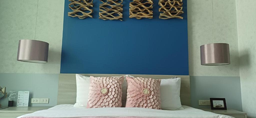 Postel nebo postele na pokoji v ubytování Mukrada House Boutique Hometel Krabi