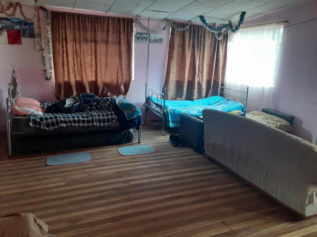 Postel nebo postele na pokoji v ubytování Hospedaje Chimborazo