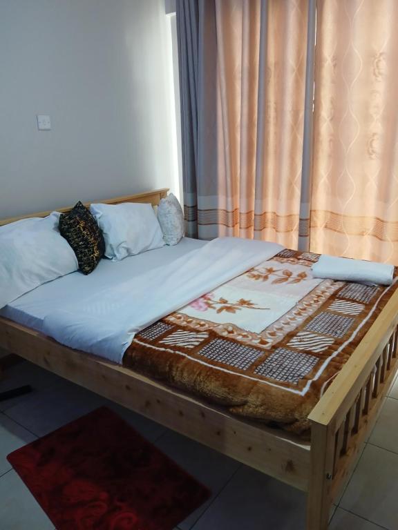 Postel nebo postele na pokoji v ubytování Designer Loft with Rooftop