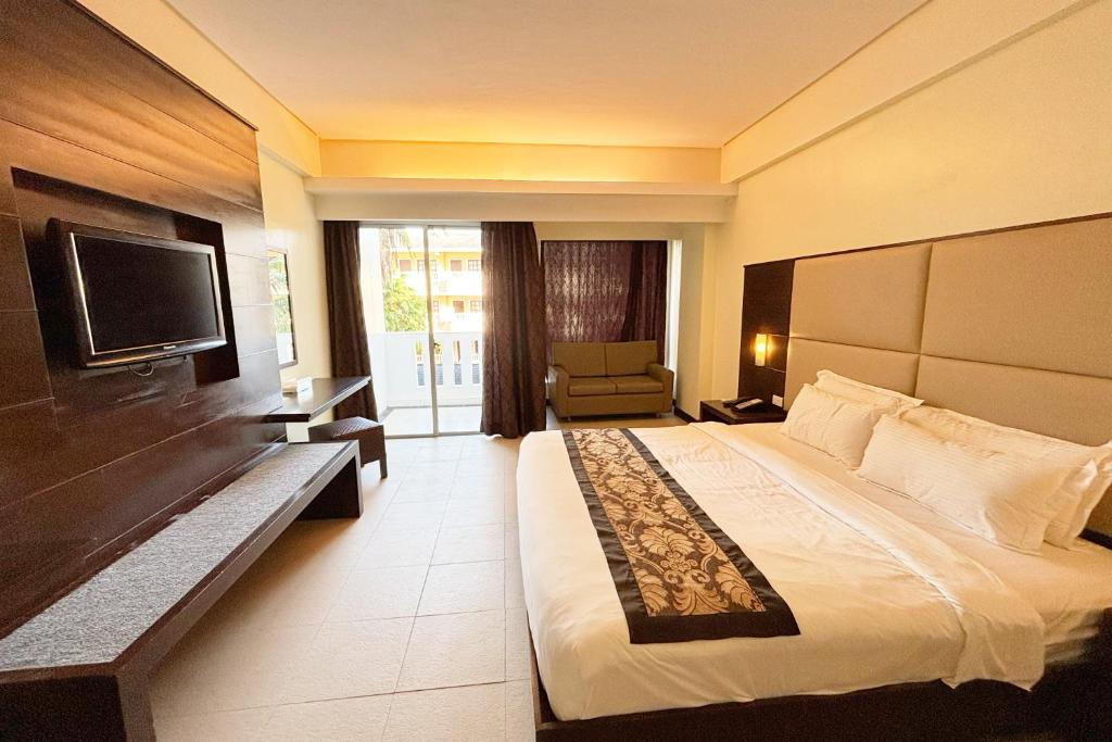 Uma televisão e/ou sistema de entretenimento em The Muse Hotel Boracay