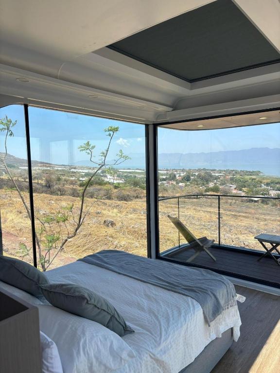 Postel nebo postele na pokoji v ubytování LUA Capsule Rooms