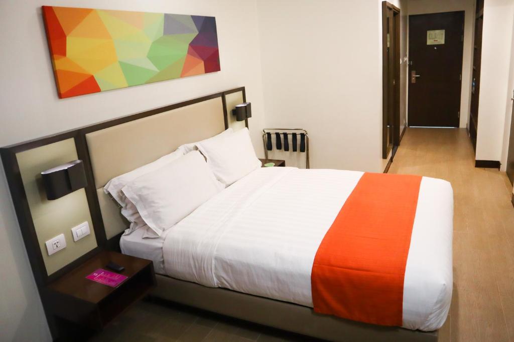 Postel nebo postele na pokoji v ubytování Hotel Lucky Chinatown Binondo