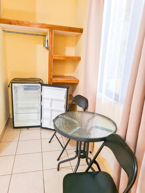 Kuchyň nebo kuchyňský kout v ubytování Cabinas Coco Alegre