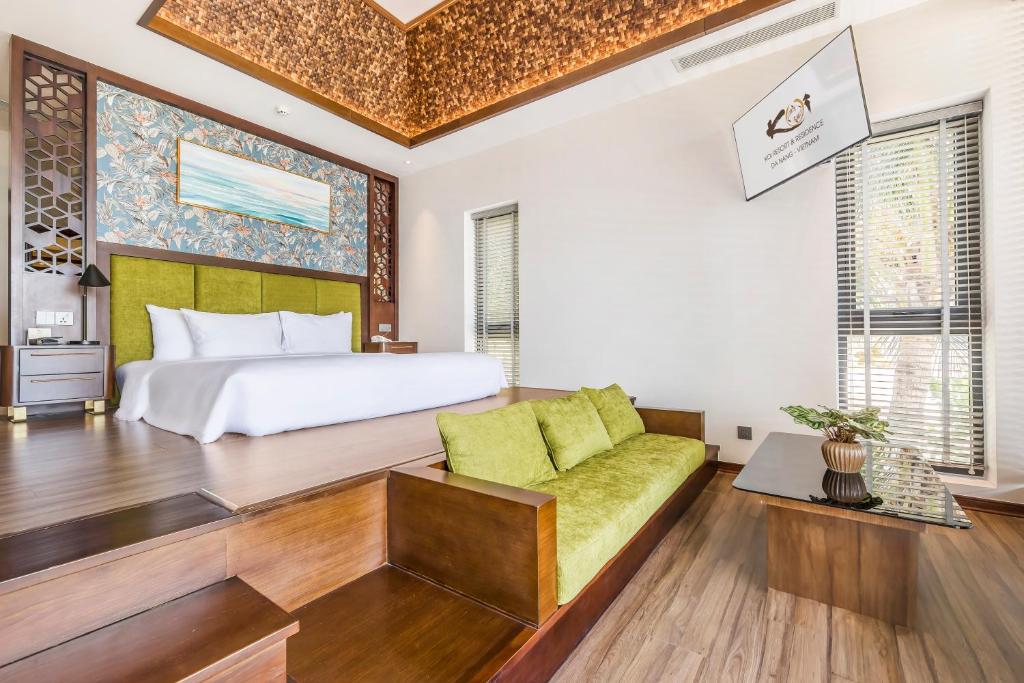 Postel nebo postele na pokoji v ubytování KOI Resort & Residence Da Nang