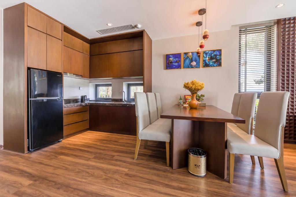 Kuchyň nebo kuchyňský kout v ubytování KOI Resort & Residence Da Nang