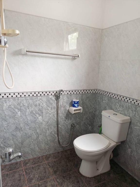 Koupelna v ubytování Maloy Hotel