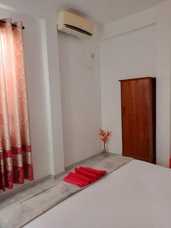 Postel nebo postele na pokoji v ubytování Maloy Hotel