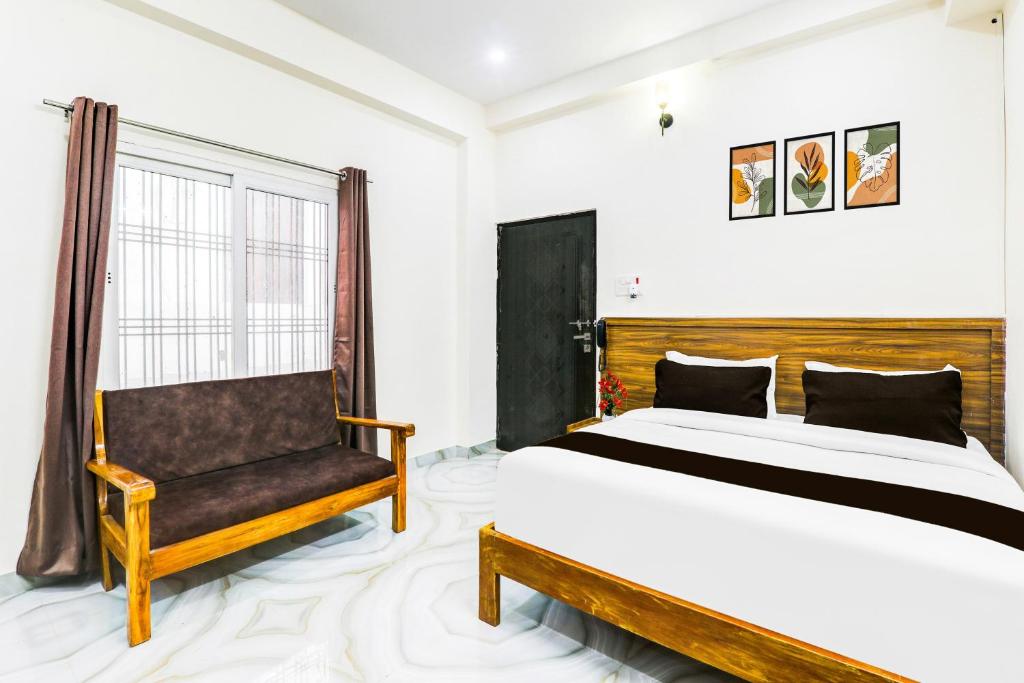 Postel nebo postele na pokoji v ubytování Super Collection O Karaudi Marg Chittaipur Varanasi