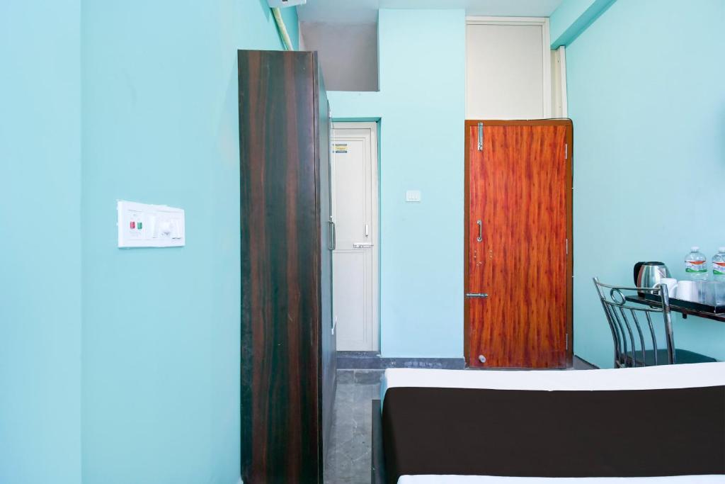 Postel nebo postele na pokoji v ubytování Hotel O Bhubaneshwar Near ITER College
