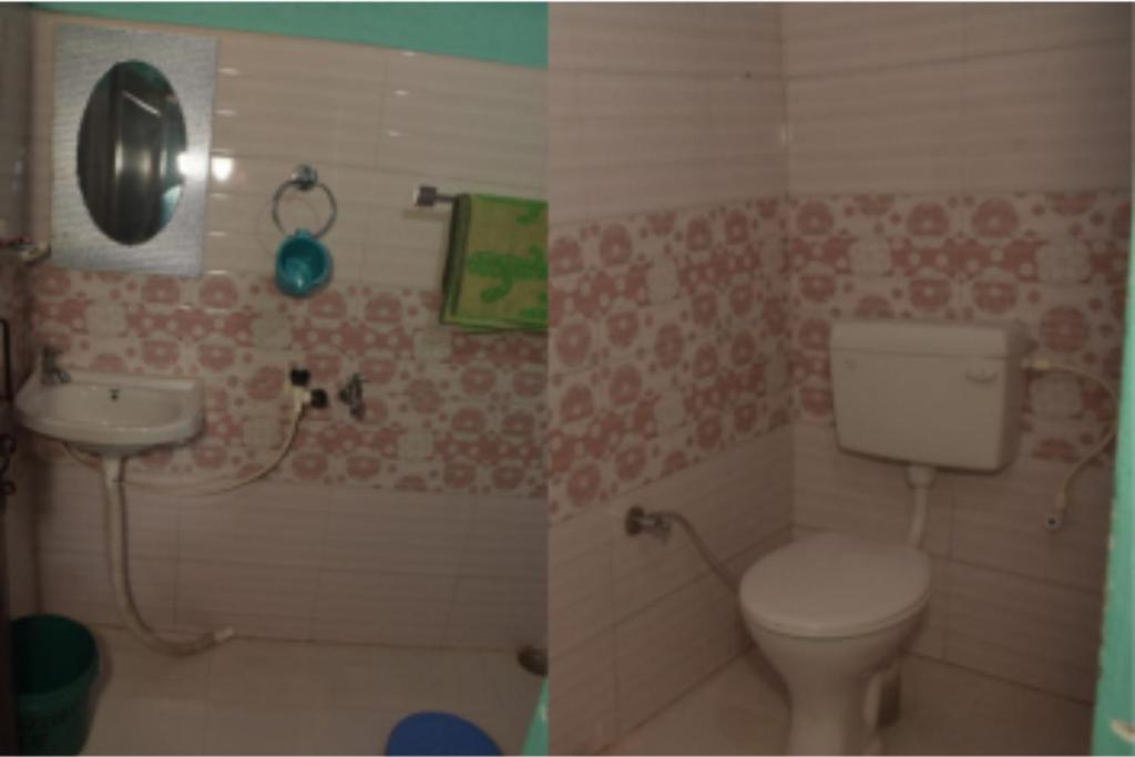 比姆塔尔Jai Somwari Baba Home Stay的带马桶和水槽的浴室