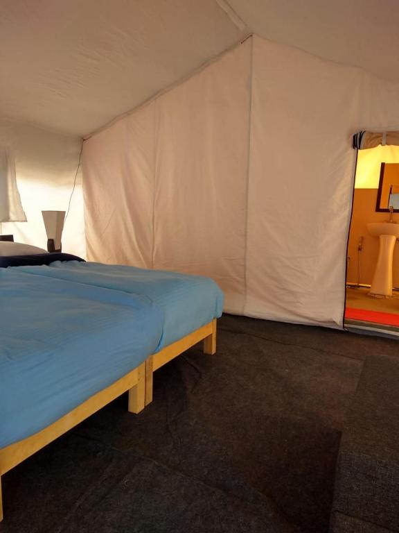 Ένα ή περισσότερα κρεβάτια σε δωμάτιο στο Tso Camp Man Pangong Lake