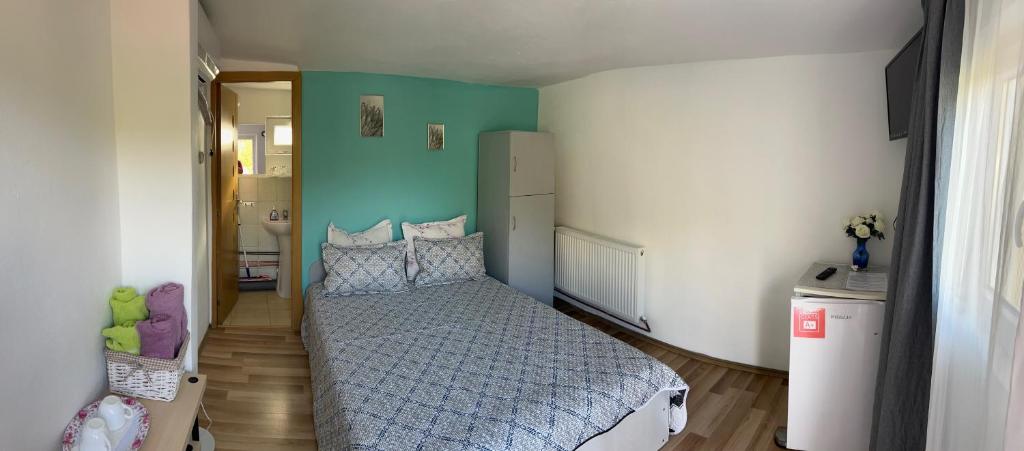 Postel nebo postele na pokoji v ubytování C a l i x