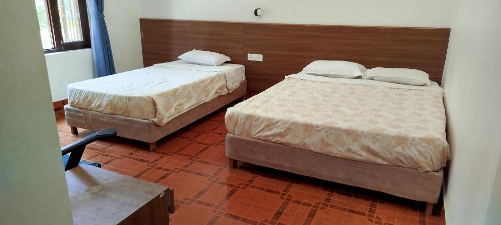 Letto o letti in una camera di Hotel Parkside & Swimming Pool-Between Greenery and Azure ,Your Perfect Retreat