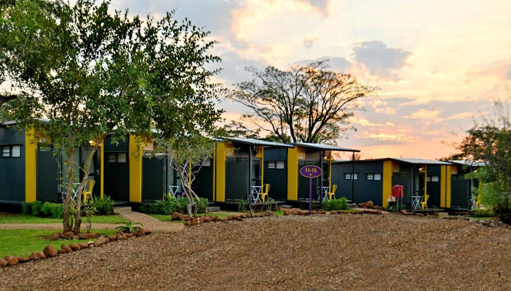 a row of rental houses in a park at SleepOver Punda Maria Gate in Punda Maria