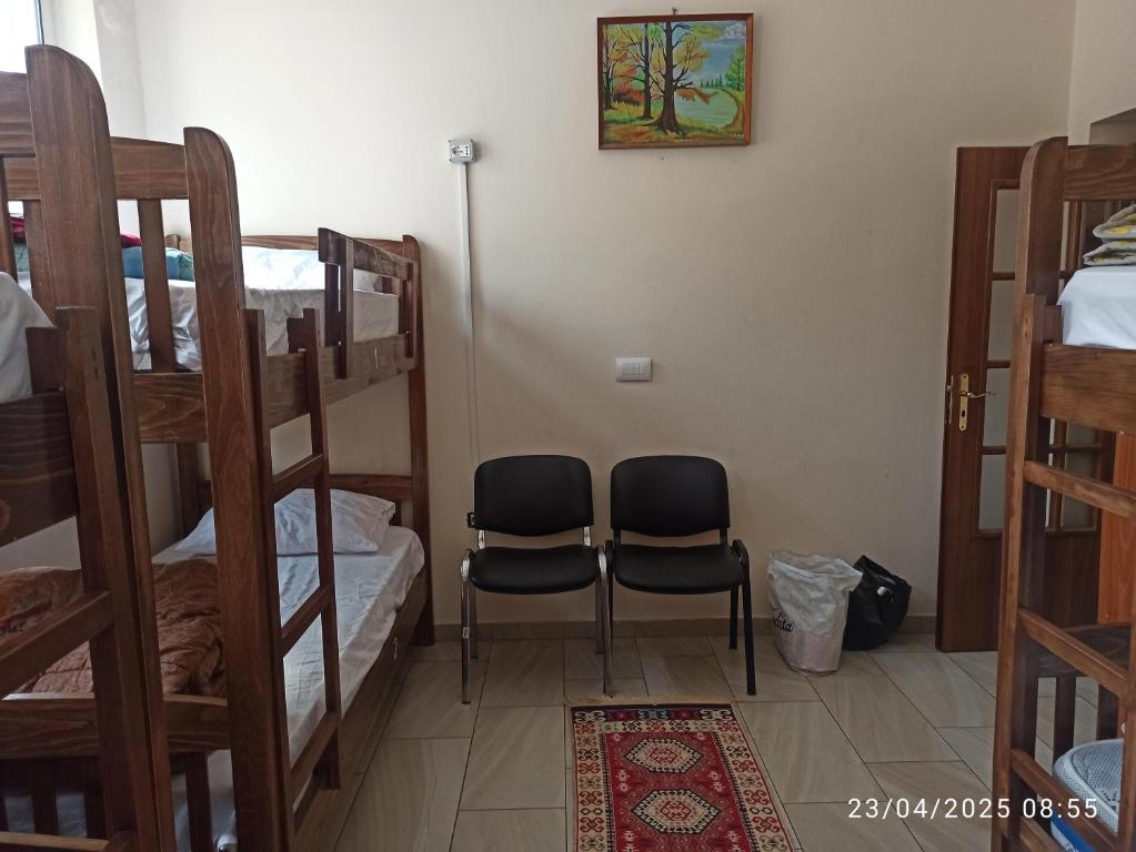 Postel nebo postele na pokoji v ubytování Rose Hostel