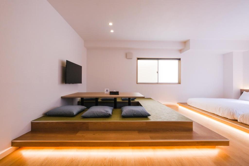 Ένα ή περισσότερα κρεβάτια σε δωμάτιο στο HOTEL ALL IN Kumamoto