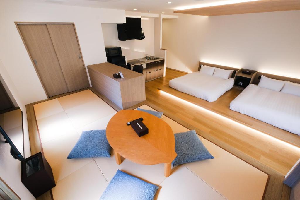 Ένα ή περισσότερα κρεβάτια σε δωμάτιο στο HOTEL ALL IN Kumamoto