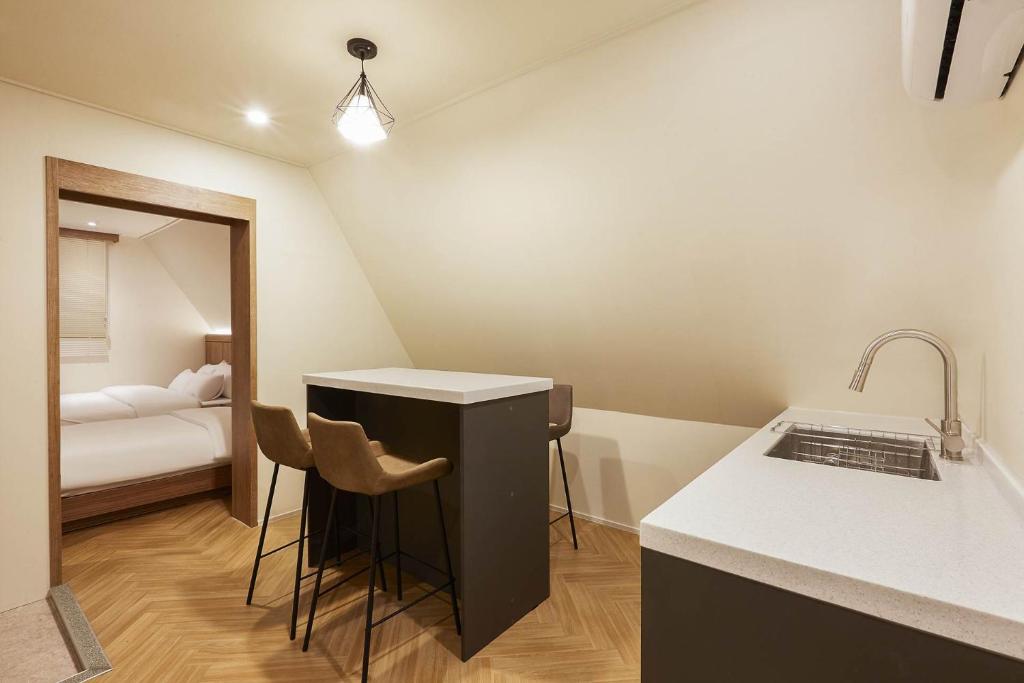 Postel nebo postele na pokoji v ubytování vane hotel