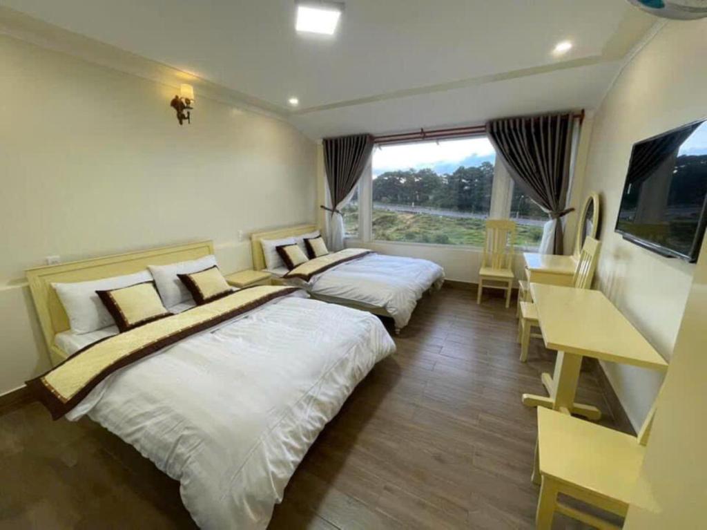 Postel nebo postele na pokoji v ubytování Hương Trà Villa