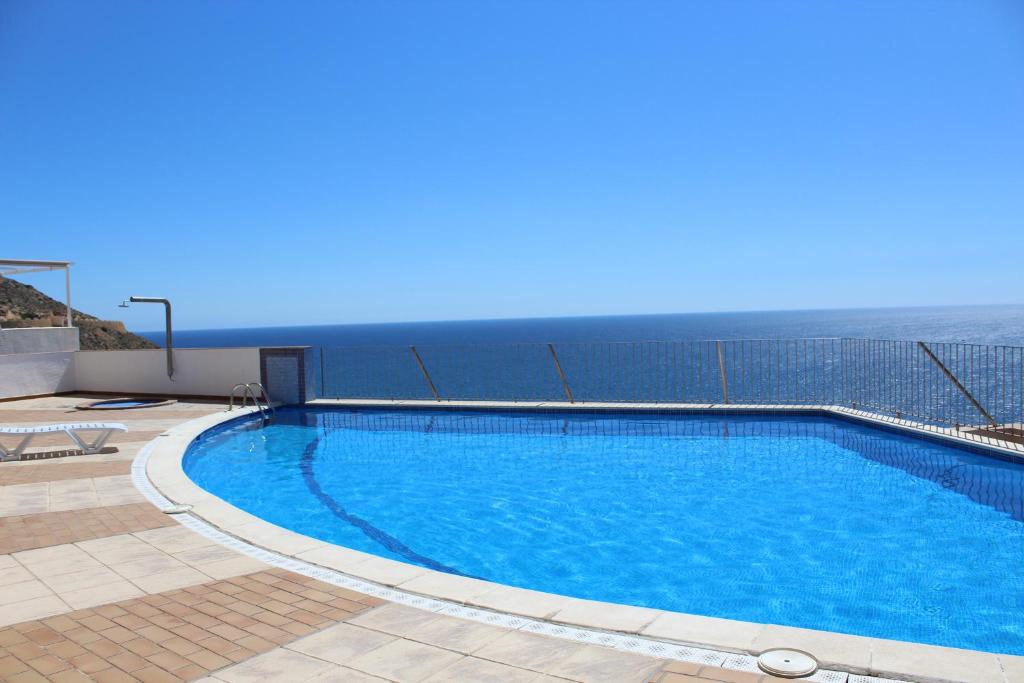 a swimming pool on the side of a building at VillaMarina Apartments - Zand Properties in Benidorm