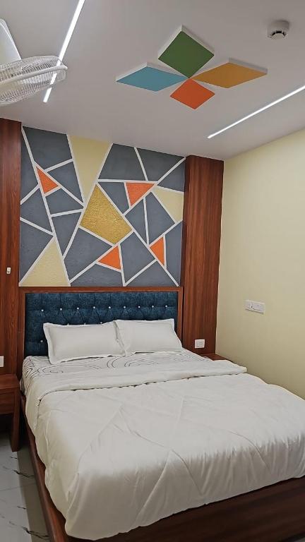 Postel nebo postele na pokoji v ubytování kangaroo hotel