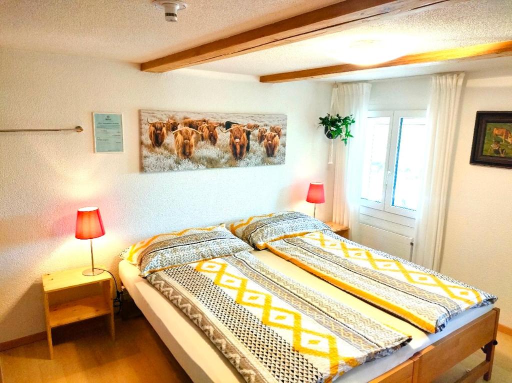 Postel nebo postele na pokoji v ubytování Nisihof, Buurenzimmer Family or Single
