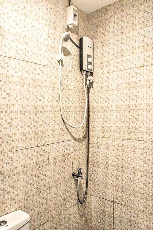 Koupelna v ubytování Hometel Barrio House Mactan