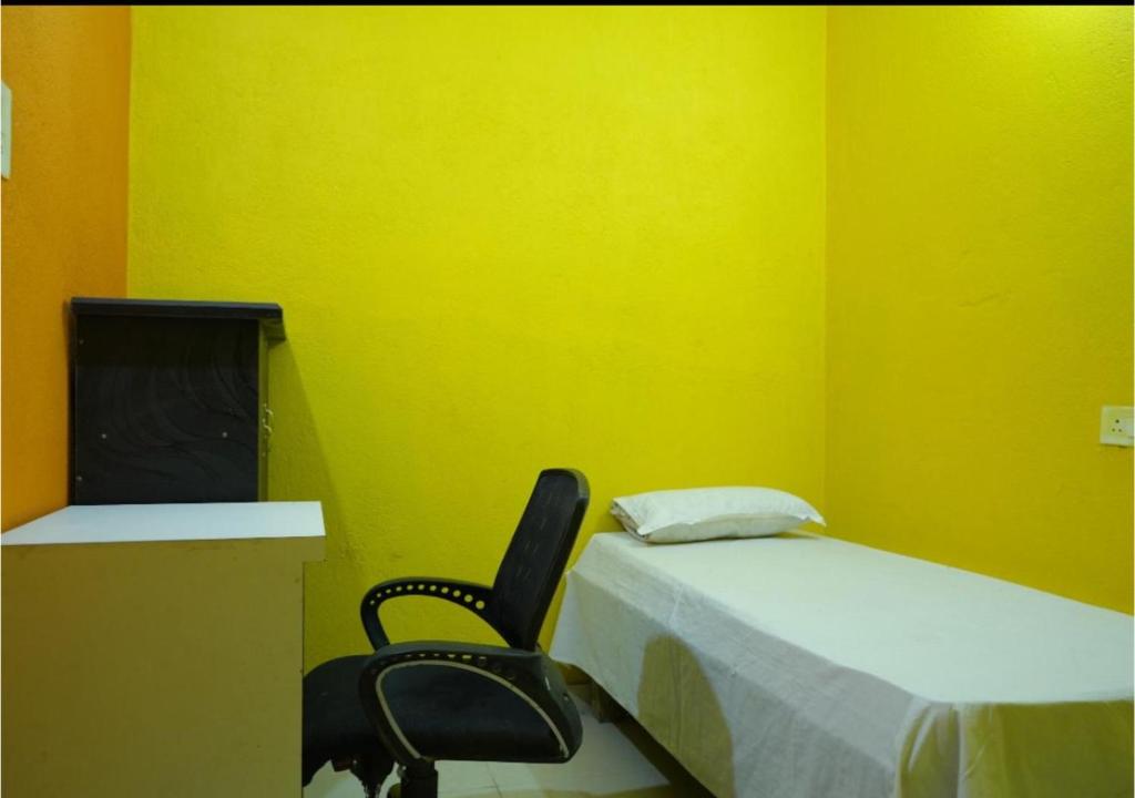 Postel nebo postele na pokoji v ubytování riru girls hostel