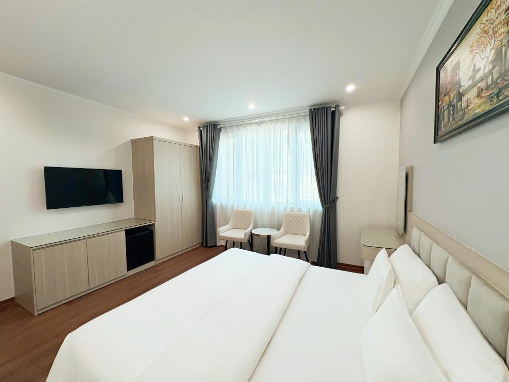 TV a/nebo společenská místnost v ubytování A25 Hotel - Hoàng Đạo Thúy 2