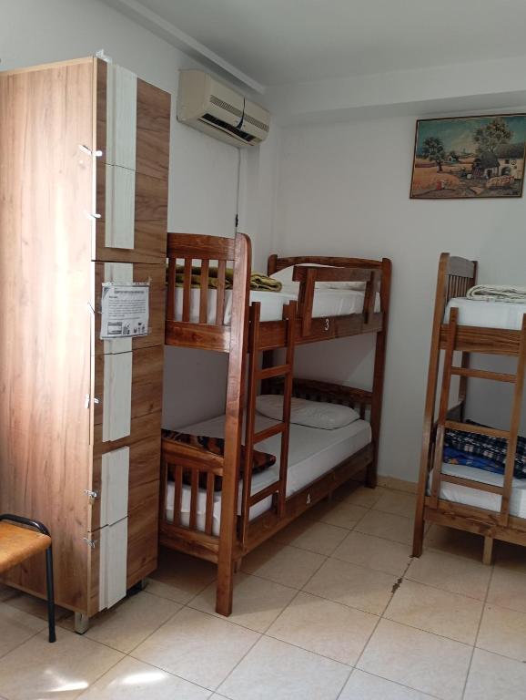 Postel nebo postele na pokoji v ubytování Rose Hostel