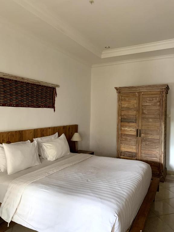Postel nebo postele na pokoji v ubytování Mina Pelasa Hotel