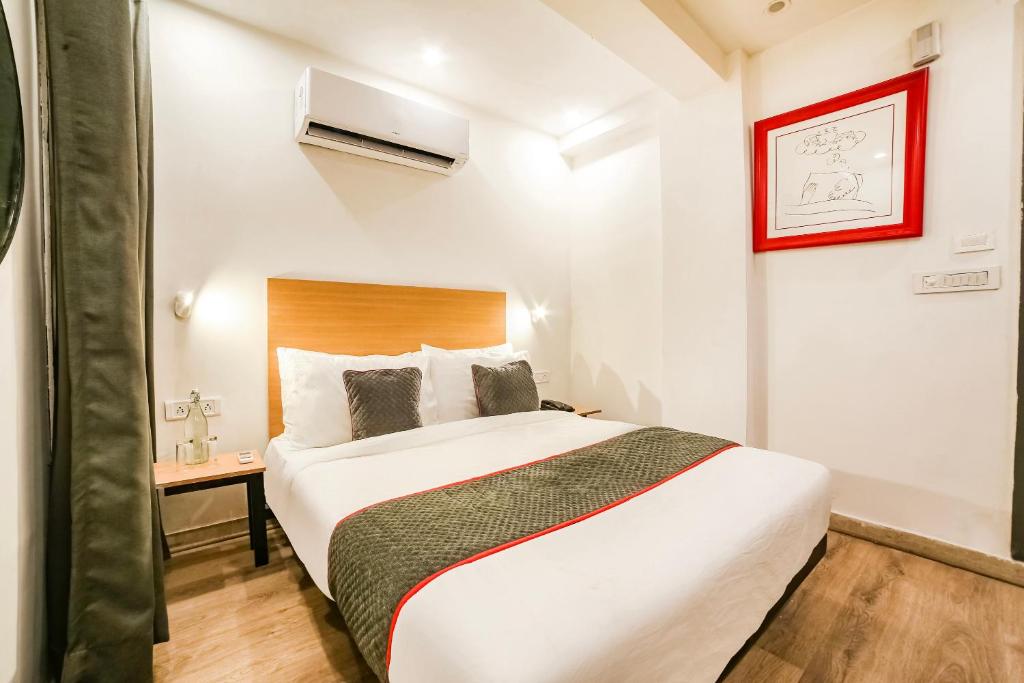Postel nebo postele na pokoji v ubytování Super Hotel O Nawada Metro