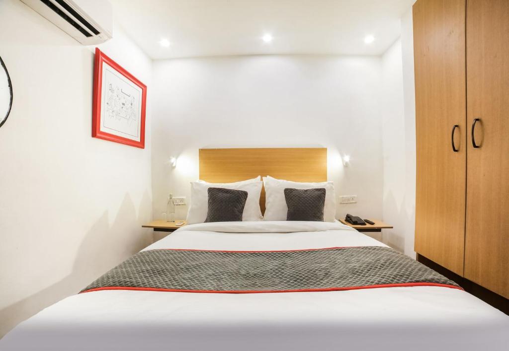 Postel nebo postele na pokoji v ubytování Super Hotel O Nawada Metro