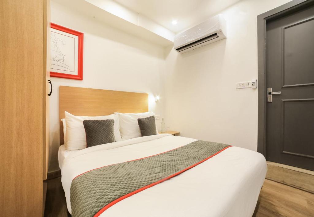 Postel nebo postele na pokoji v ubytování Super Hotel O Nawada Metro