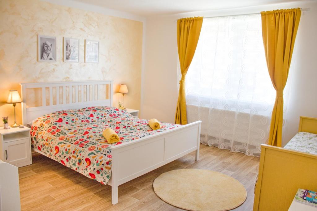 Postel nebo postele na pokoji v ubytování Dvě deci - Mikulov