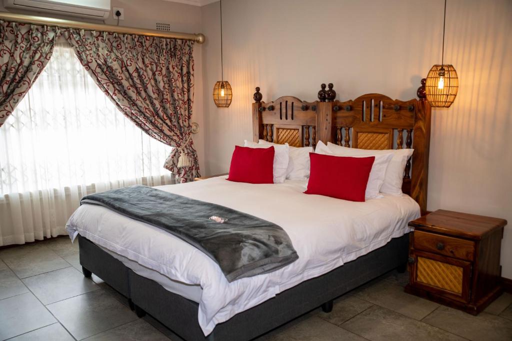 Postel nebo postele na pokoji v ubytování Iso'Bella Vita Guesthouse