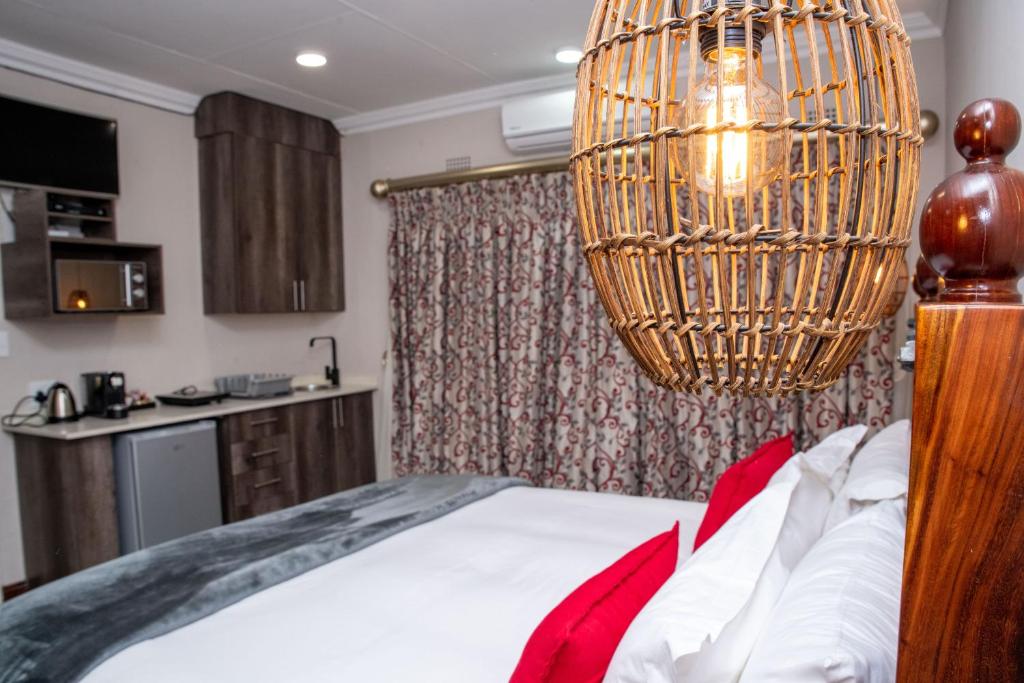 Postel nebo postele na pokoji v ubytování Iso'Bella Vita Guesthouse