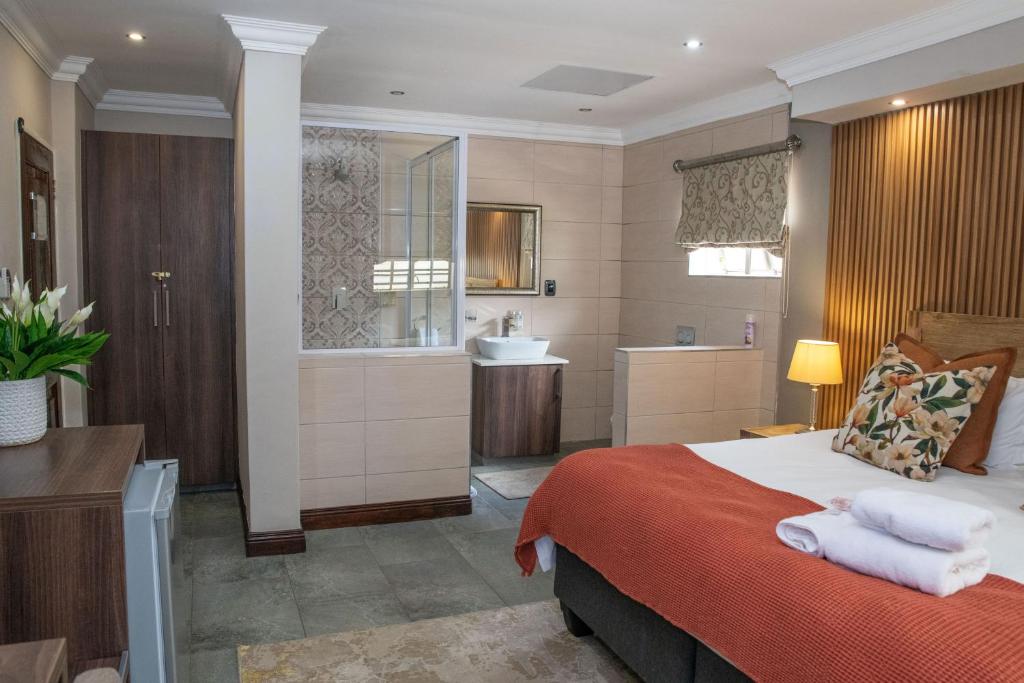 Postel nebo postele na pokoji v ubytování Iso'Bella Vita Guesthouse